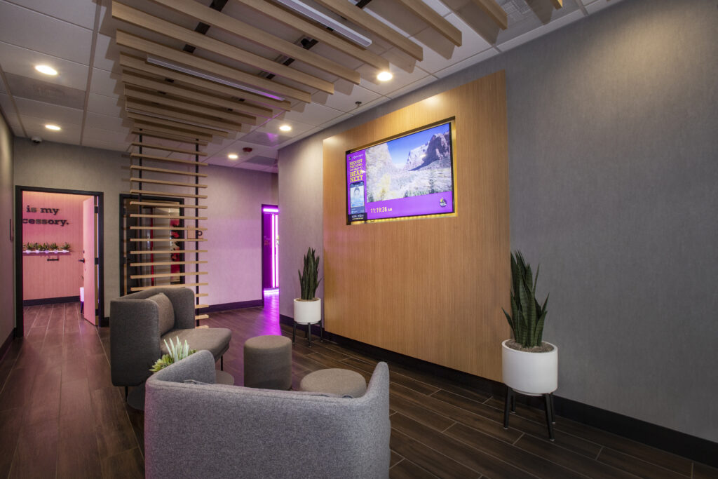 Planet Fitness Black Card Spa interior with neon lighting
