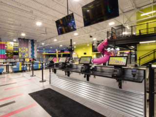 interior, Urban Air, check in area with play gym in background